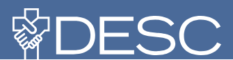 white letters DESC on blue background next to two hands forming a cross